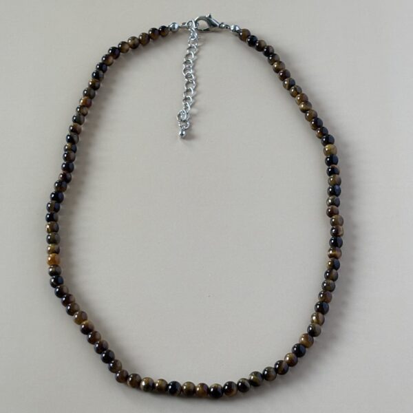 Bijou artisanal collier perles œil de tigre – force et équilibre