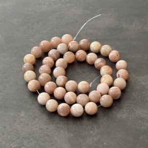 Perles pierre de soleil 8 mm, énergie positive et création artisanale