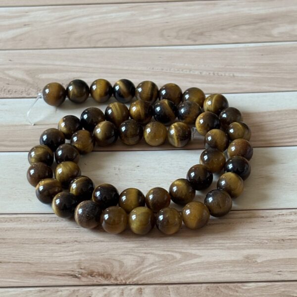 Perles 8 mm œil de tigre pour bijoux artisanaux apportant protection et force intérieure