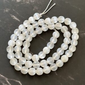Perles de sélénite 6 mm translucides utilisées en création de bijoux et accessoires DIY