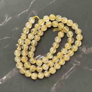 Quartz rutile doré en perles 6 mm polies