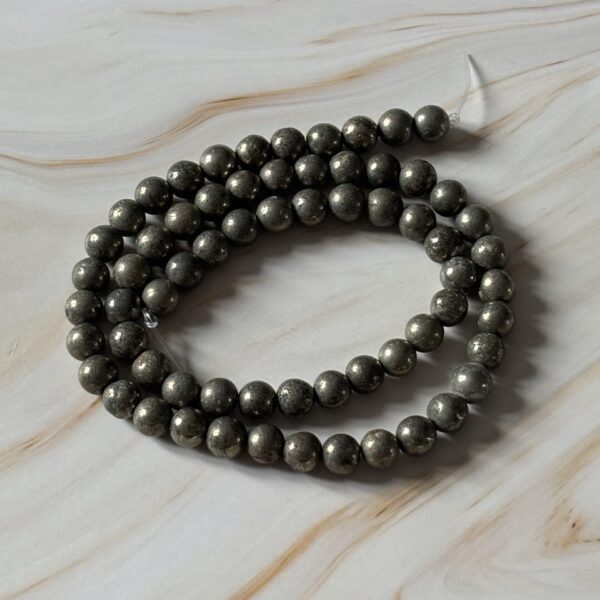 Pyrite polie en perles rondes 6 mm, minéral naturel