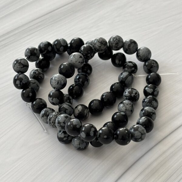 Bijoux faits main avec perles d’obsidienne neige naturelles