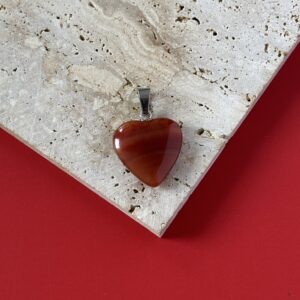 Pendentif coeur cornaline lithothérapie énergie positive et courage