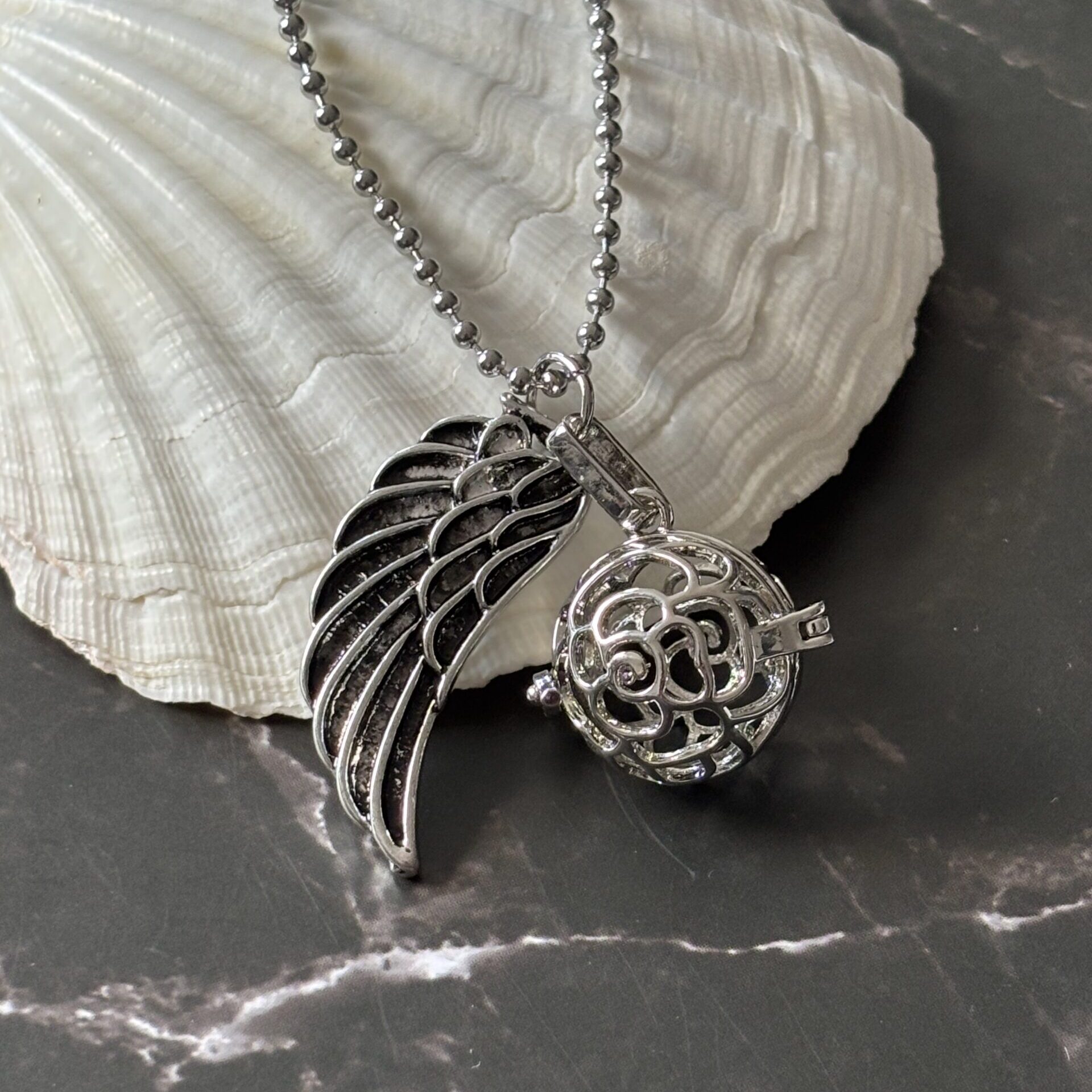 Collier grossesse Bola cage spirale accueillant perle ou pierre énergétique