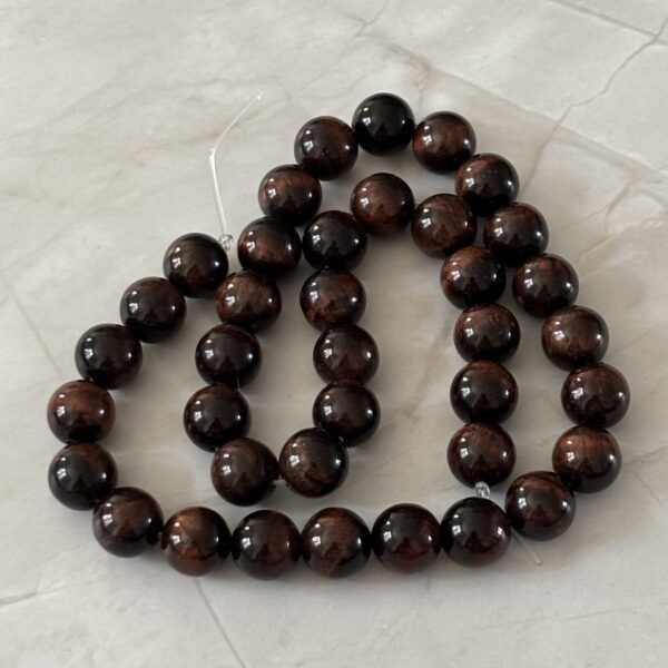 Perles 10 mm œil de taureau énergie et vitalité