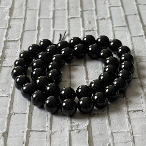 Perles 10 mm tourmaline noire pour création artisanale protection énergétique