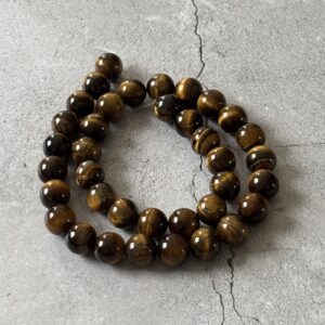Perles rondes 10 mm en Œil de Tigre brun doré