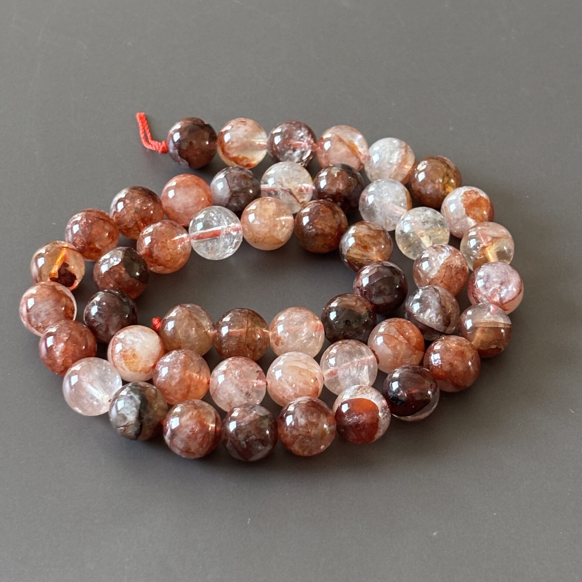 Perles 8 mm quartz hématoïde pour ancrage, force intérieure et vitalité