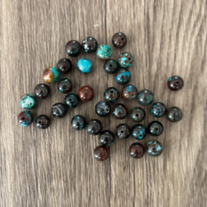 chrysocolle foncé naturel en perles de 6 ou 8 mm vendu à l'unité, en lot ou fil complet