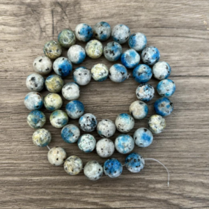 Jaspe bleu ou k2 naturel en perles de 6 ou 8 mm vendu à l'unité, en lot ou fil complet