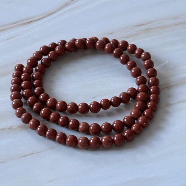 Perles naturelles jaspe rouge 4 mm courage