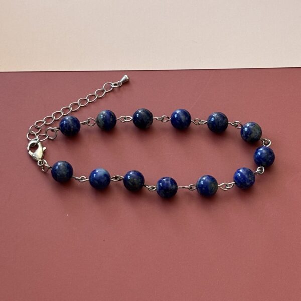 Bracelet lithothérapie en pierres de lapis lazuli et métal argenté, style raffiné
