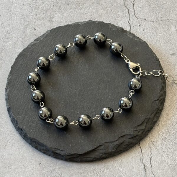 Bracelet énergétique en hématite et métal argenté, protection et équilibre au quotidien