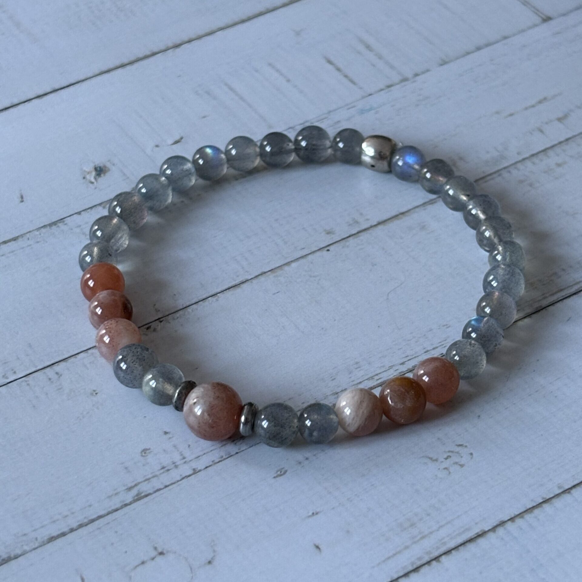 Bijou poisson labradorite et pierre de soleil harmonisation