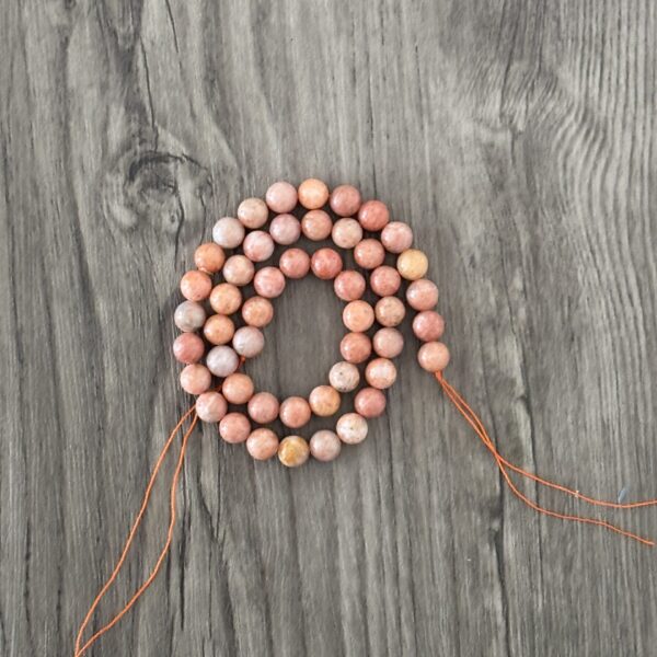 Calcite orange naturel en perles de 6 ou 8 mm