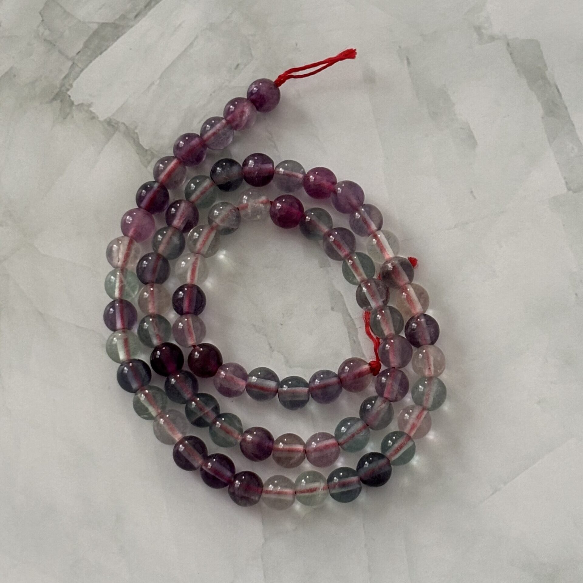 Perles fluorite 6 mm pour créations artisanales colorées