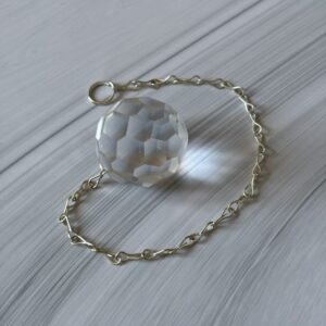 Pendule de radiesthésie sphère cristal de roche à facettes