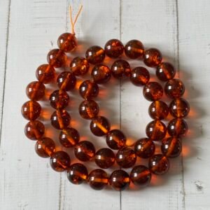 Perles ambre baltique 10 mm naturelles couleur miel pour création de bijoux
