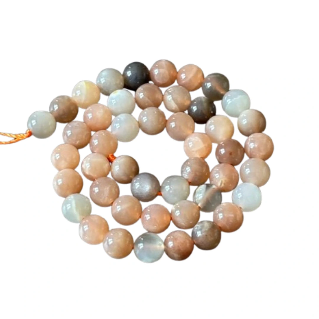Perles de pierre de lune naturelles pour création de bijoux et bracelets artisanaux.